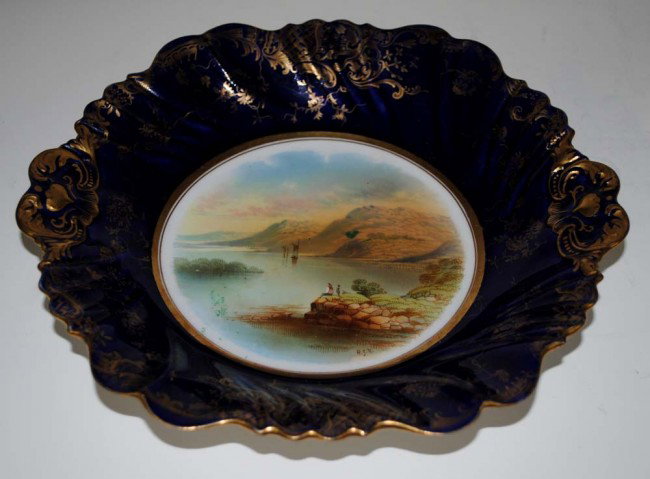 GROUP OF FOUR PORCELAIN DISHES: Comprising: Royal Berlin oval tray, length 9 1/2"; three English Paragon porcelain dishes painted with topographical views. (300/400)