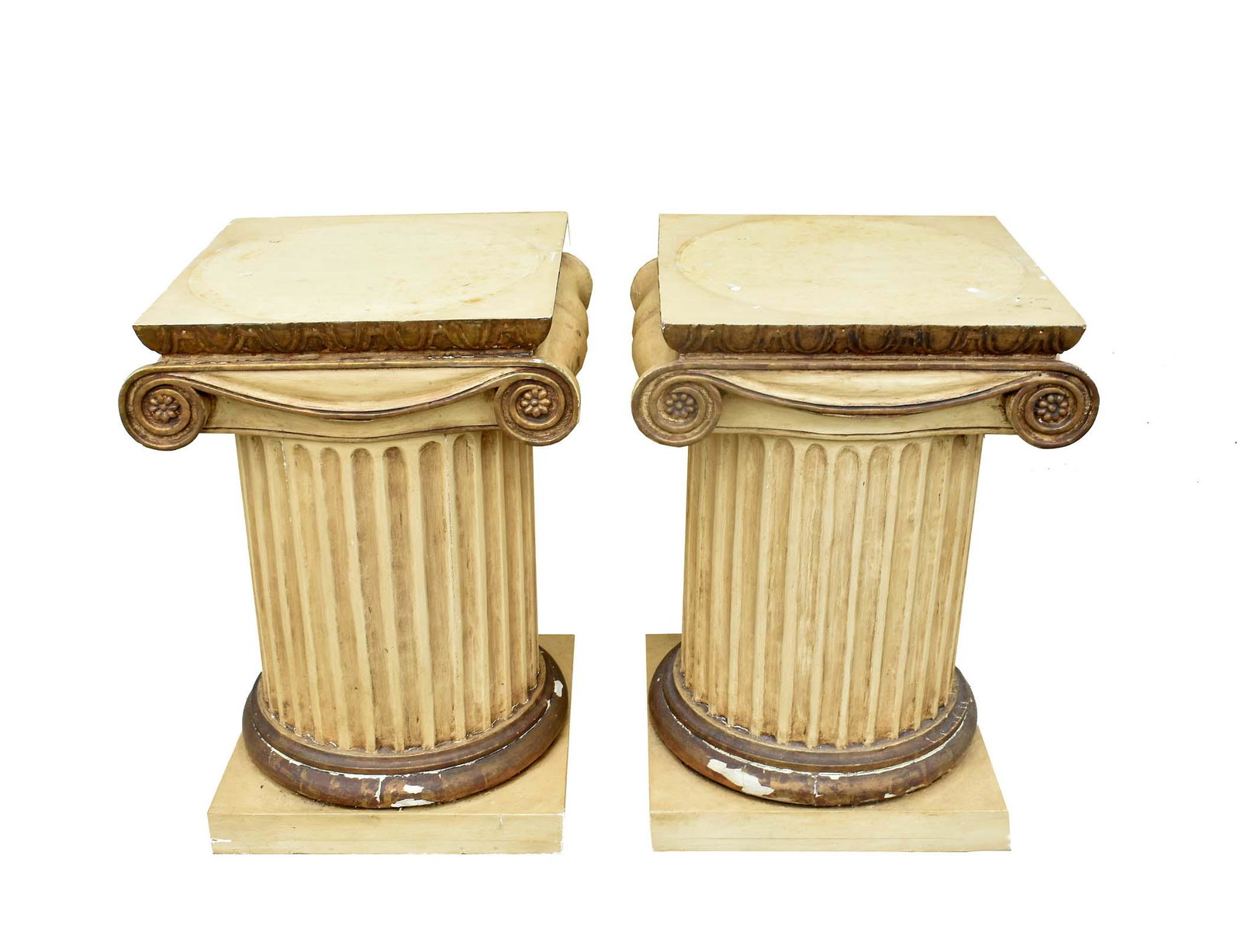 PAIR OF NEOCLASSICAL PAINTED & GILT WOOD PEDESTALS: 20th Century. Each fluted columnar shaft with a laurel leaf wreath at the base, headed by an ionic capital, atop a square plinth. Height 27 in. Width 20 in. Depth 17 in.