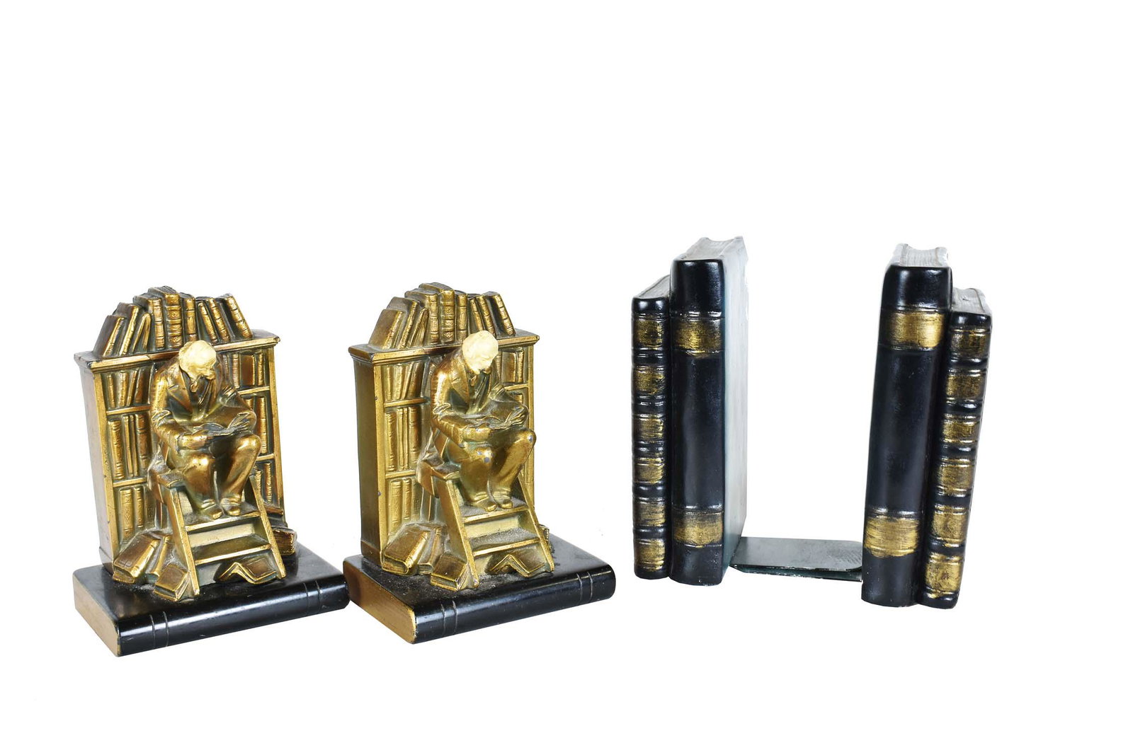 TWO PAIRS OF LIBRARY BOOKENDS: 20th Century. The first, bronze clad, of a gentleman seated uon a ladder before a book-filled bookcase. The second, painted plaster in the form of two leather-bound books. Heights 6.75, 7 in. Width 4.