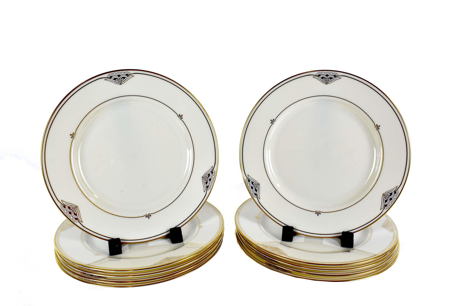 TEN GORHAM FLORENTINE PORCELAIN DESSERT PLATES: Marked on the underside. The rim of each plate with three evenly spaced stylized motifs. Diameter 8.5 in.