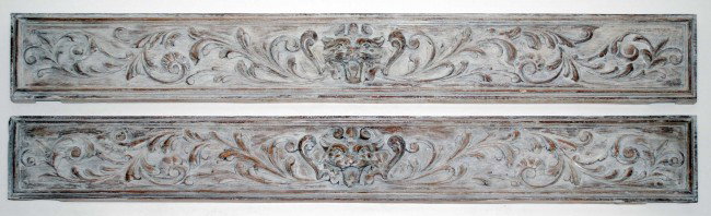 PR RENAISS. STYLE CARVED & PICKLED OAK OVERDOORS: European. Each centered by a lion mask. Measuring 10 1/4" by 74 1/2". (600/800)