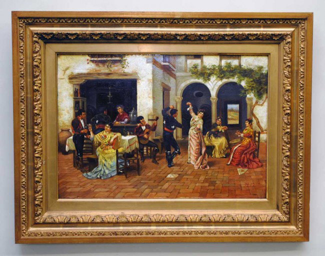 ENRIQUE RUMOROSO (Spanish. 19th Century): "Flamenco Scene". Signed and dated 1889 l/r. Oil on Panel. Measuring 13 3/4" by 20". Antique gesso cast frame. (Cond: good) (800/1200)