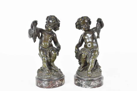 PAIR OF CLODION PATINATED BRONZE YOUTH SCULPTURES: French. Late 19th Century. Inscribed on the reverse [Claude-Michel] Clodion in script. Each scantily-clad boy seated atop a stump, and holding fish or a bird, on a white veined black marble base.