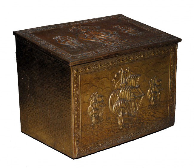 BRASS CLAD FIREWOOD BOX: Embossed with Columbus' fleet. Length 18". (100/150)