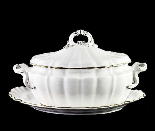 ROYAL WORCESTER PORCELAIN TUREEN, COVER AND STAND: English. Each with blanc de chine glaze and gilt highlights. Length of stand 15 1/2".