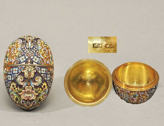 RUSSIAN SILVER GILT AND SHADED ENAMEL EGG: Moscow. 1908-1917. (.88 Standard) Maker: Probably Alexander Kordes. In blue, green, pink and yellow shaded enamels. Height 4 ¼". (2000/3000)