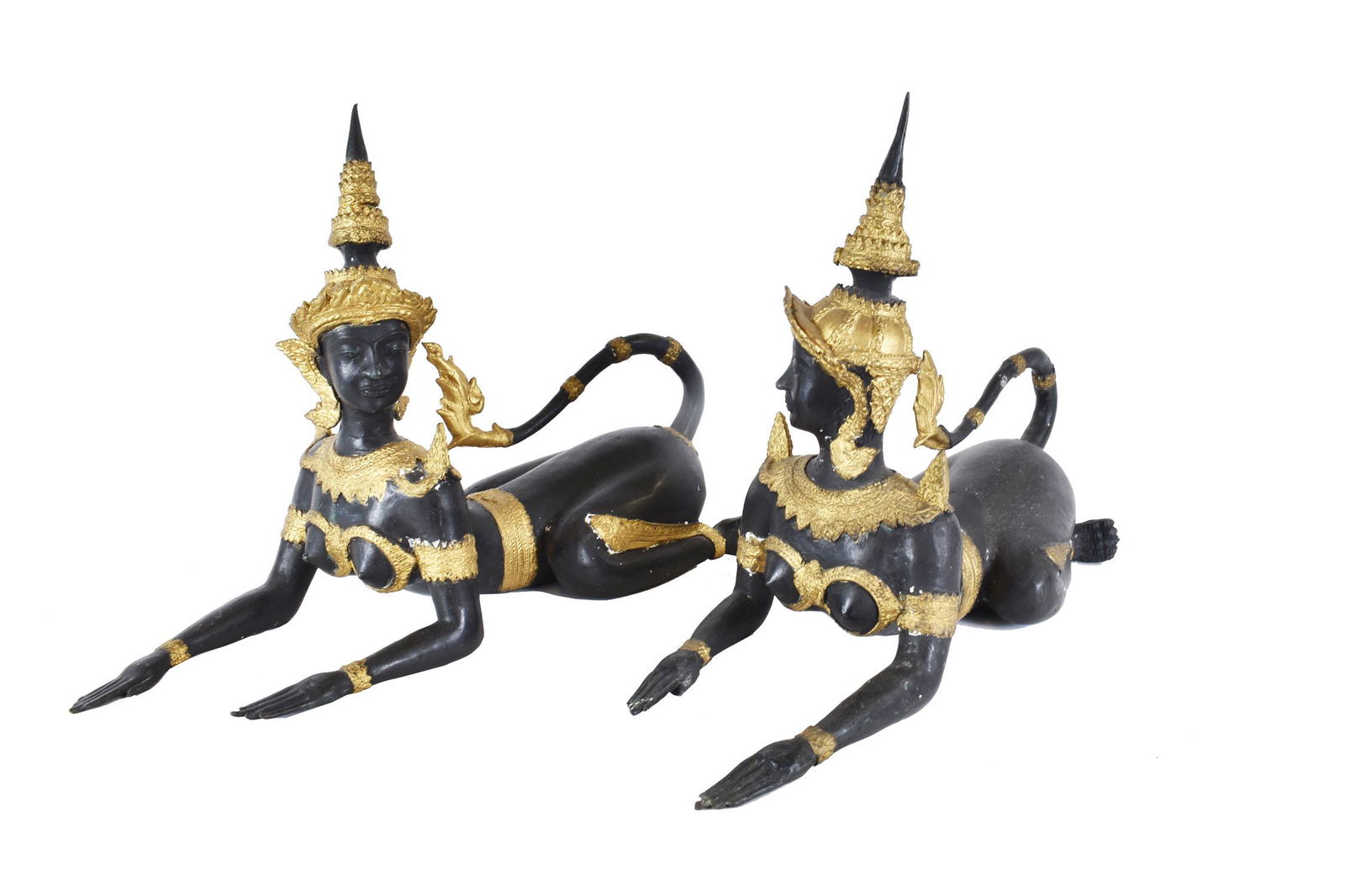 PAIR OF THAI PARCEL GILT EBONIZED METAL SPHINXES (1 of 3)