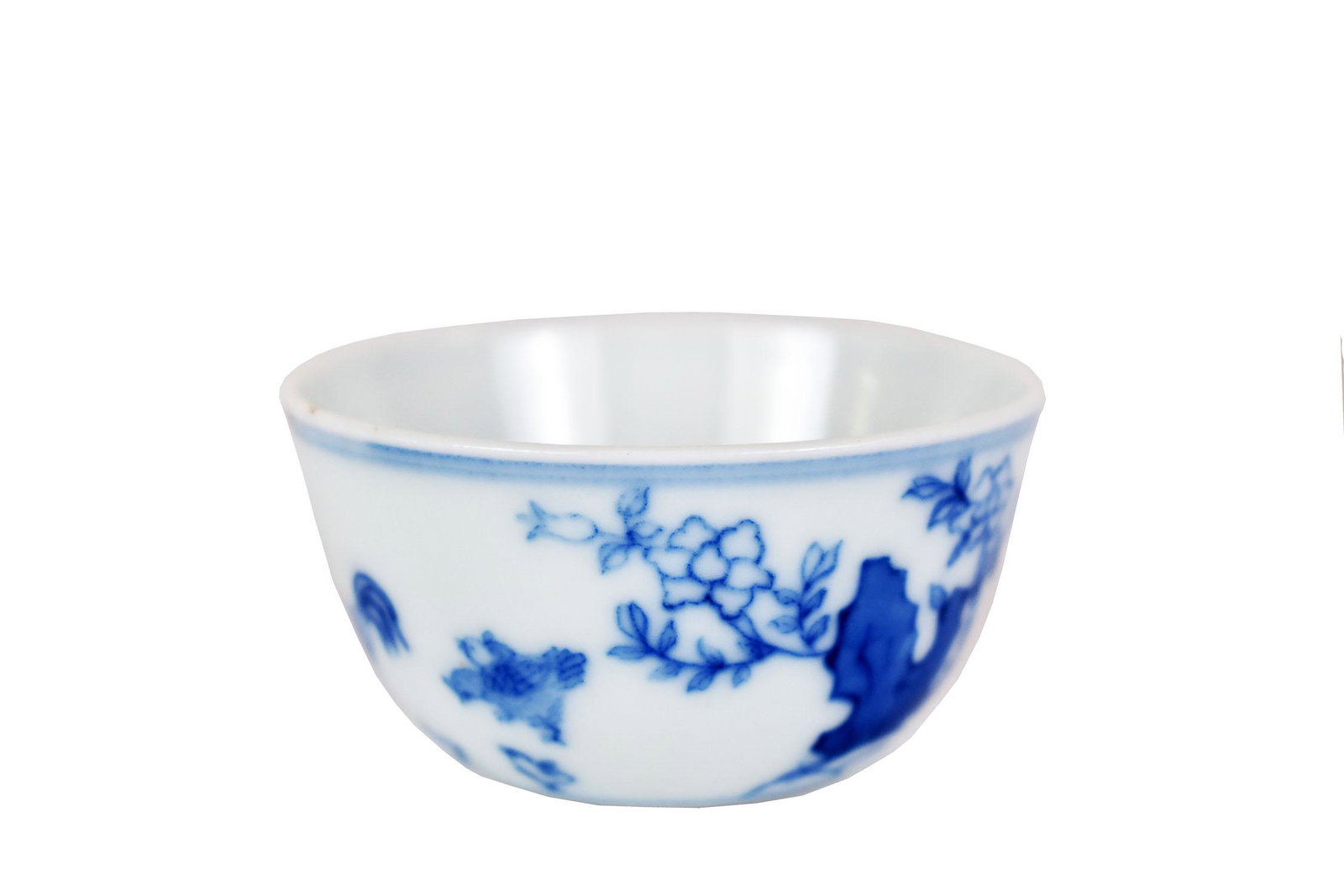 CHINESE BLUE AND WHITE PORCELAIN CUP: Probably Qing Dynasty. Marked in underglaze blue with a six-character Ming seal. Decorated with sparse landscapes and domestic foul. Height 1.25 in. Diameter 2.25 in.