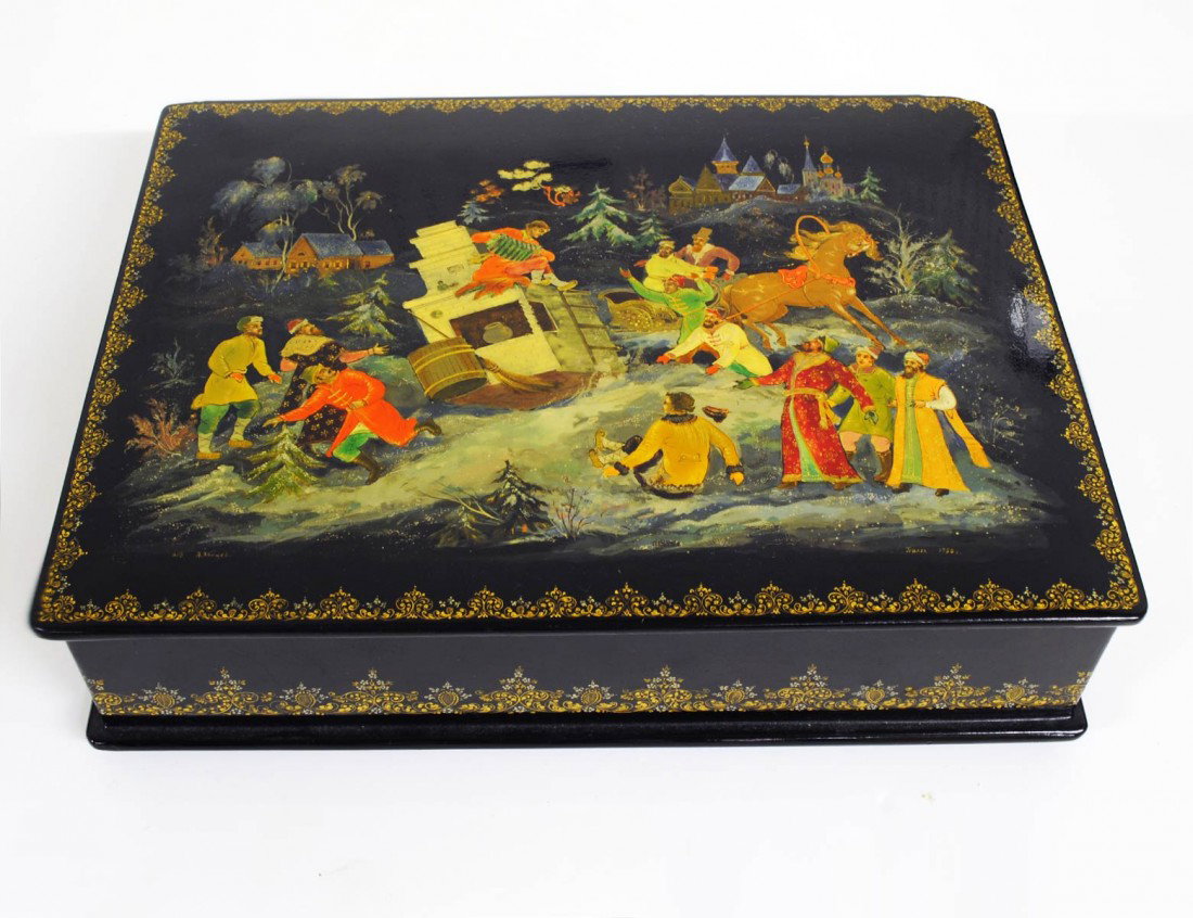 PAINTED AND LACQUERED PAPIER MACHE BOX: Russian. Dated 1958. Signed in Cyrillic. Length 10 5/8". (Cond: chip to one corner) (300/400)