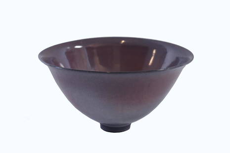 JAMES LOVERA (American. 1920-2015) CERAMIC BOWL: Signed. The circular tapering bowl with a raised circular foot, with a light claret glaze continuing down a light blue gray hued glaze, to fade to a red to turquoise glaze. Height 4.5 in. Diameter 8.2