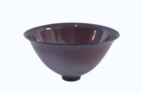 JAMES LOVERA (American. 1920-2015) CERAMIC BOWL: Signed. The circular tapering bowl with a raised circular foot, with a light claret glaze continuing down a light blue gray hued glaze, to fade to a red to turquoise glaze. Height 4.5 in. 