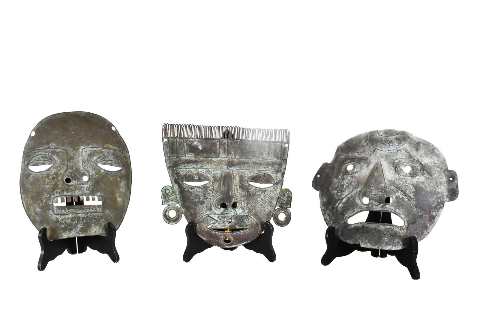 THREE MEXICAN PATINATED COPPER MASKS (1 of 4)