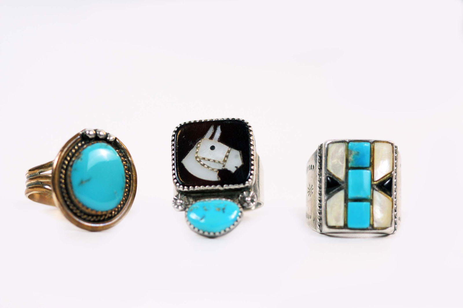 THREE NAVAJO SILVER, TURQUOISE, M.O.P & ONYX RINGS (1 of 6)