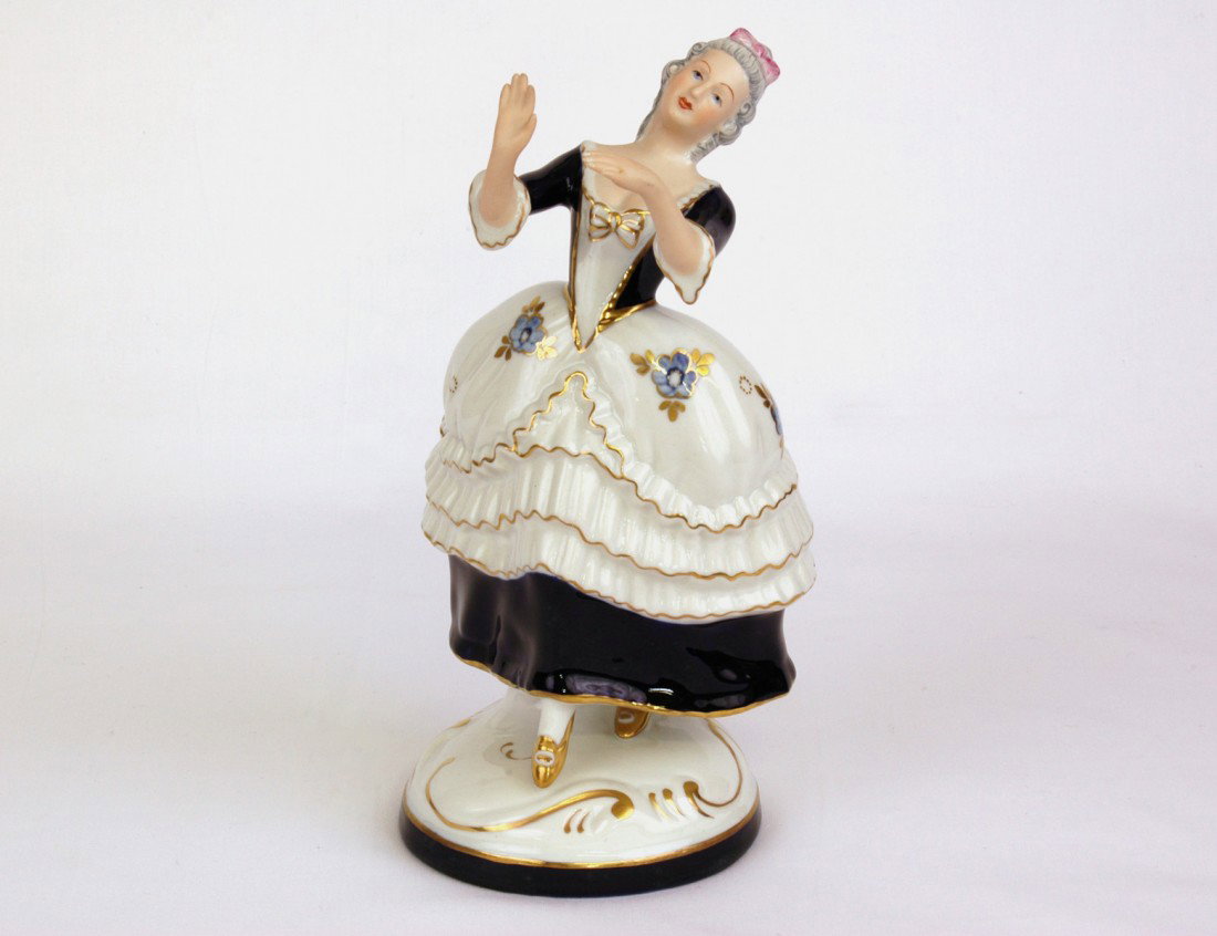 ROYAL DUX PORCELAIN FIGURE OF DANCER: Czechoslovakian. Embossed triangle mark, number 3794. Height 8 1/2". (150/200)