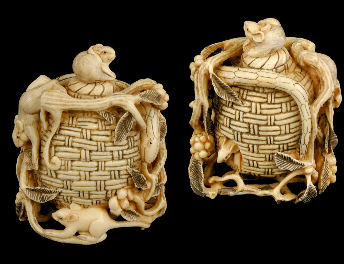 CARVED IVORY SNUFF BOTTLE: Chinese. In the form of a straw bale surrounded by branches and rats. Height 2 1/4". (300/400)