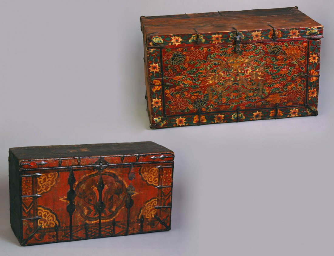TWO PAINTED LEATHER AND WOOD TRUNKS: Each with iron appointments. Heights 20 1/2" and 20 3/4". Lengths 35 1/2" and 38 1/2". Depths 14 1/4" and 16 3/4". (400/600)