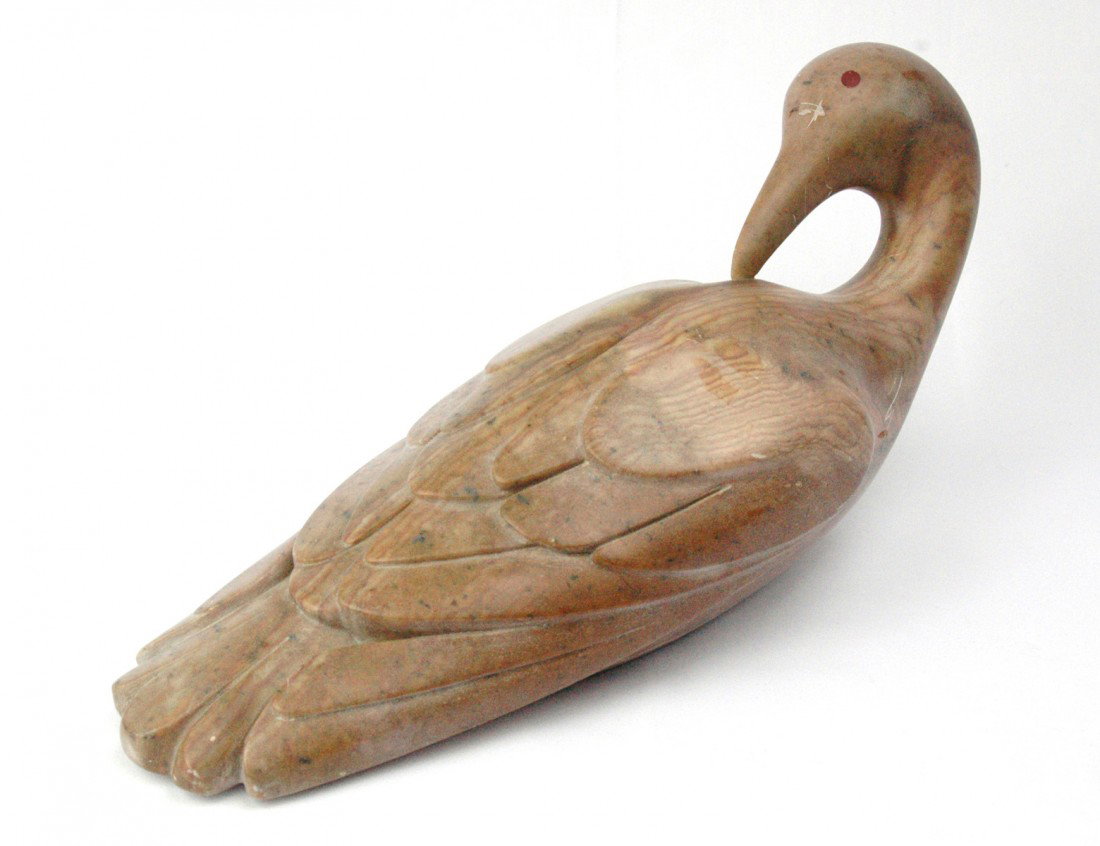 CARVED SOAPSTONE FIGURE OF A LOON: Inuit, Paulatuk. By Abraham Anghik. Length 15 3/4". (Cond: scratches) With original Canadian government certificate. Provenance: Images Art Gallery, Inc. Toronto, Ontario, Canada. (700/1000)