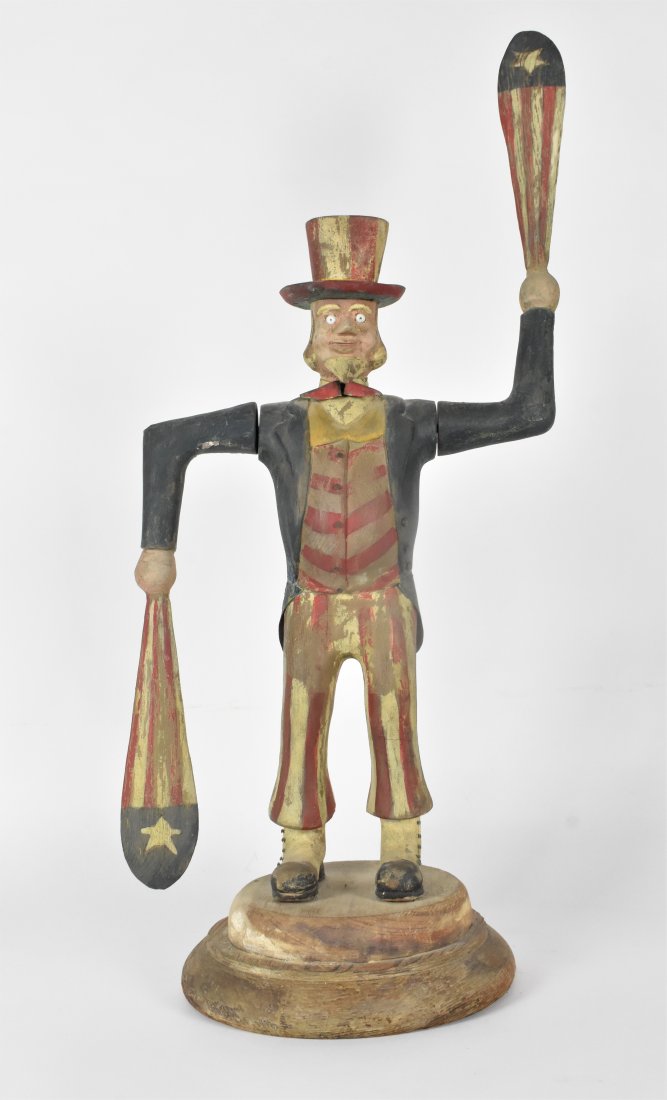 THOMAS LANGAN, A PAINTED, CARVED UNCLE SAM WHIRLIGIG (1 of 2)