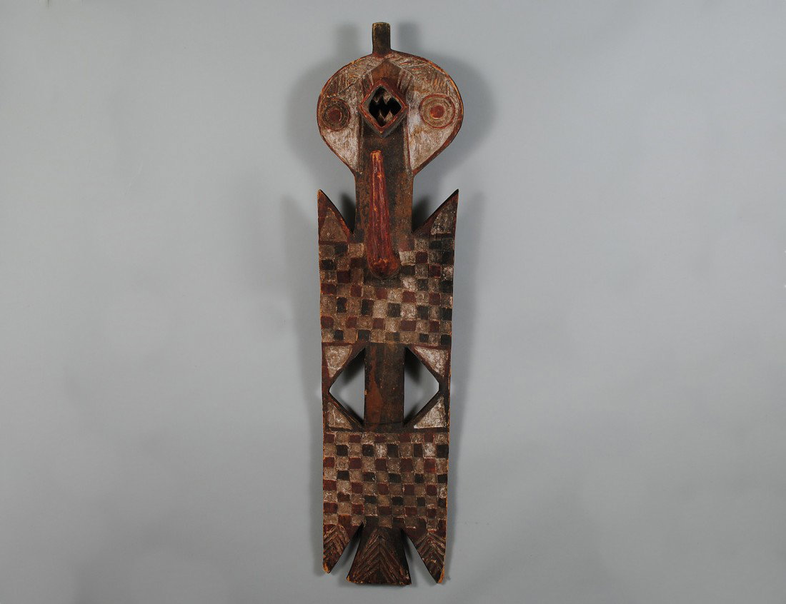 AFRICAN BOBO TRIBAL ART: Carved Wood with Paint. Height 49". Width 12". (Cond: surface weathered and worn, some nicks and splits) (100/200)