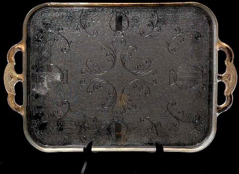 Depression Glass Two Handled Tray: Depression Glass Two Handled Tray. Beaded Base Decorated with Scrolls and Harps Flanked by Double Handles Gold Gilt Rim. 15 1/4 Inches High 9 3/4 Inches Wide. No Mark Visible. Condition Good, Losses t