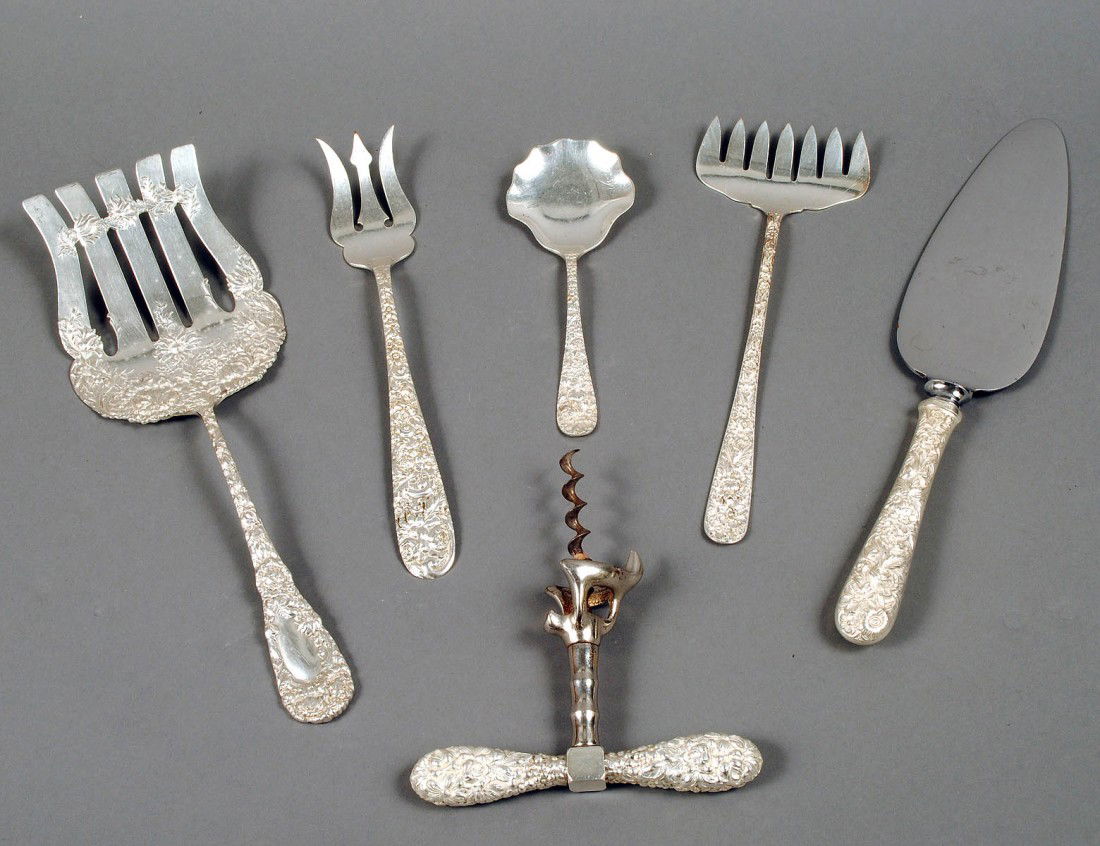 GROUP OF SIX REPOUSSE STERLING SILVER SERVING PIECE: American. 20th Century. Various makers. Comprising: pie server, large fork, jelly spoon, two forks and a corkscrew. (16 oz) (350/450)