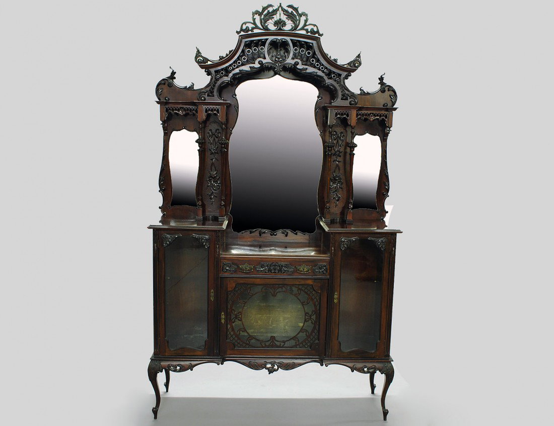 VICTORIAN MAHOGANY CREDENZA: 19th Century. The mirrored superstructure with pierced crown above thestepped case fitted with a drawer and three glazed doors. Height 93". Width 54 1/4". Depth 16 1/2". (800/1200)