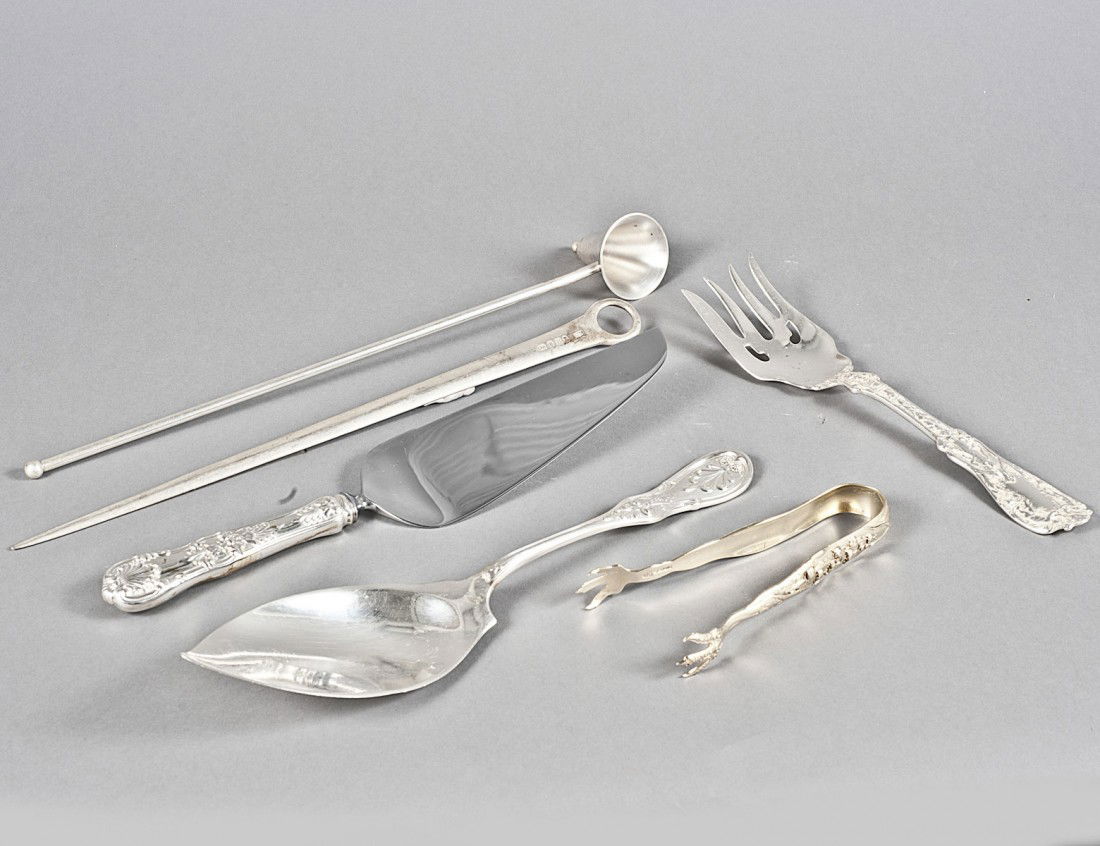 GROUP OF SIX STERLING SILVER FLATWARE PIECES: Comprising: Tiffany & Co. fish slice, pie knife and candle snuffer, Gorham serving fork, Whiting gilt sugar tongs and a George III, London 1797, meat skewer by George Smith. (18 oz) (400/500)