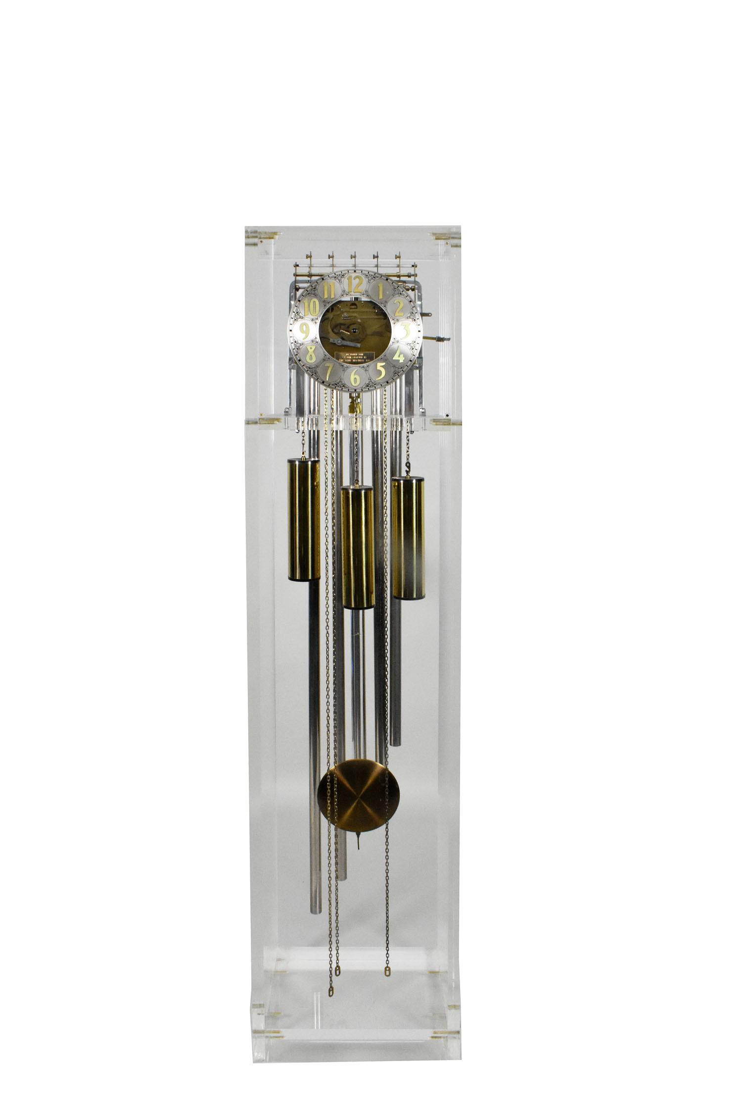 CONTEMPORARY LUCITE TALL CASE CLOCK, Howard Miller. The Lucite case with a brass dial, playing (1 of 6)