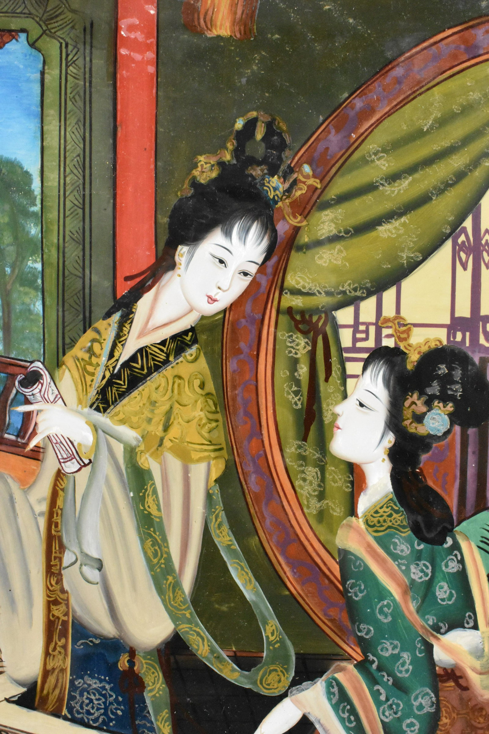 CHINESE REVERSE PAINTING ON GLASS, Depicting two women on a terrace, ebonized wood frame. Overall,: CHINESE REVERSE PAINTING ON GLASS Depicting two women on a terrace, ebonized wood frame. Overall, 17.75 by 14 in.
