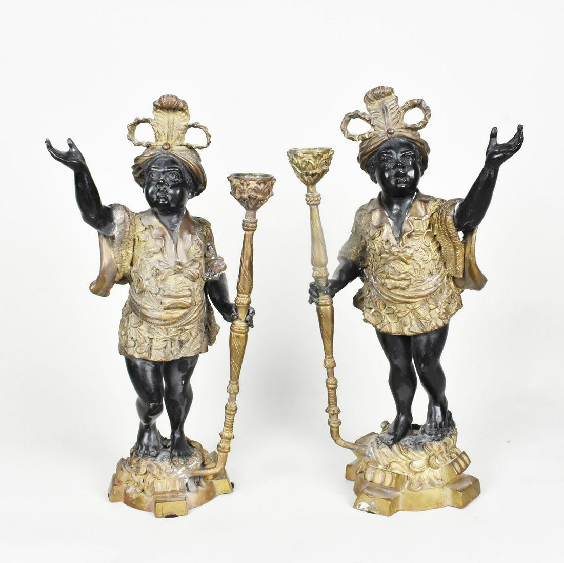 PAIR OF PATINATED BRONZE BLACKAMOOR CANDLESTICKS Fanciful dressed, with feathered turban, holding a (1 of 6)