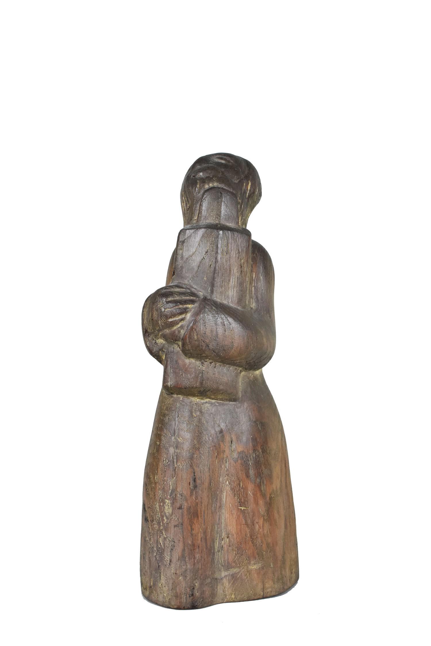 AMERICAN SCHOOL, MODERNIST CARVED OAK FIGURE OF MOSES, Circa 1945. The bearded figure holding the: AMERICAN SCHOOL, MODERNIST CARVED OAK FIGURE OF MOSES Circa 1945. The bearded figure holding the tablets. Height 20 in., Width 7.25 in. Depth 5.75 in.