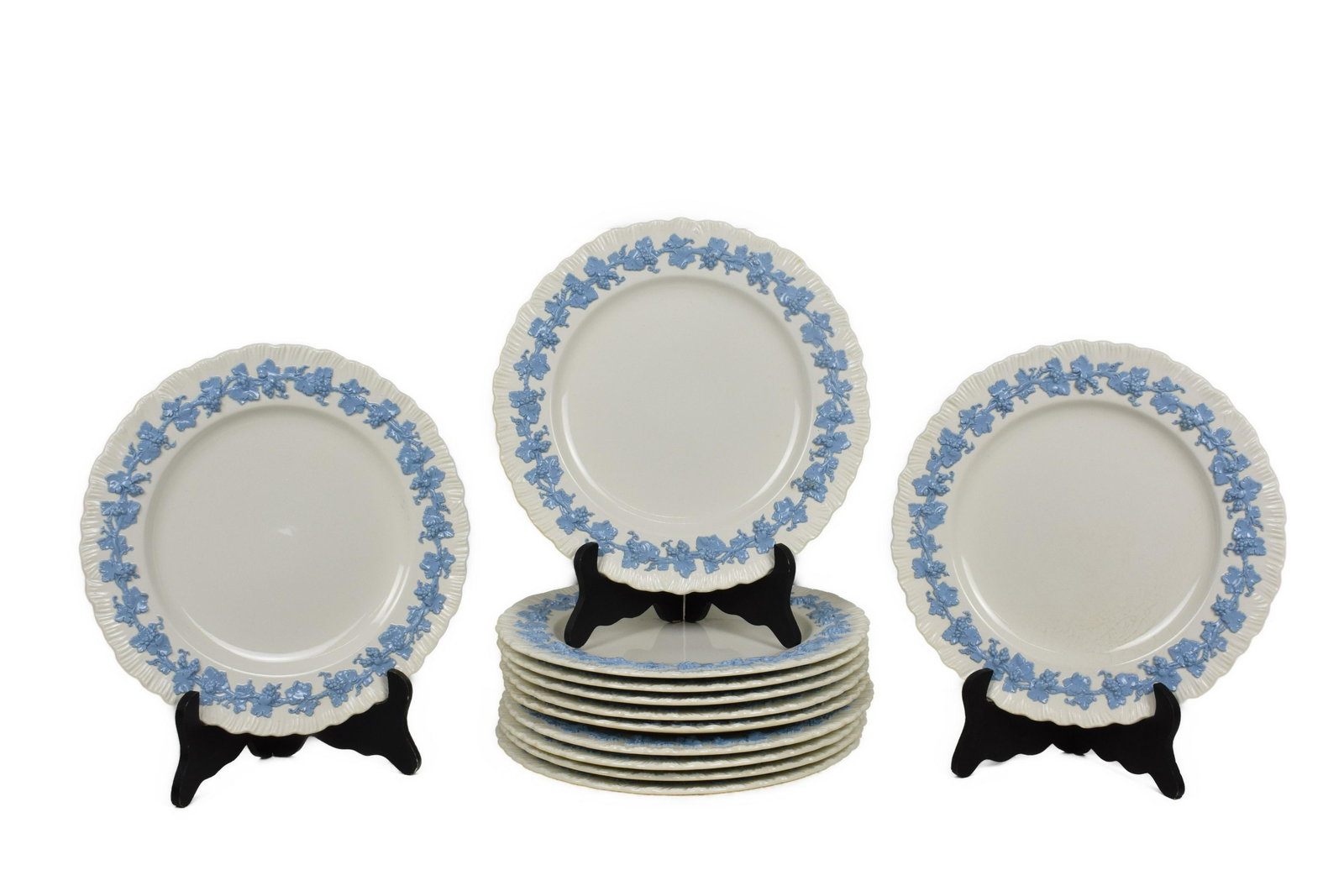WEDGWOOD EMBOSSED QUEENSWARE PLATES, The underside marked. Circular with a ruffled scalloped edge, (1 of 3)