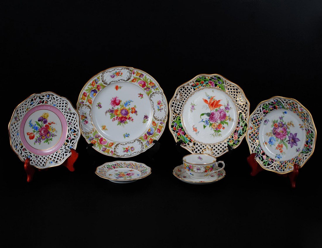 SEVENTY-THREE PIECE SCHUMANN PORCELAIN ASSEMBLED P: SEVENTY-THREE PIECE SCHUMANN PORCELAIN ASSEMBLED PART DINNER SERVICE German. 20th Century. Comprising: twelve service plates, nine dinner plates with reticulated shoulder, twelve salad plates with ret