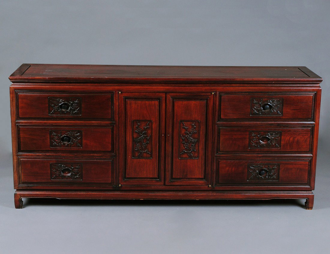 FOUR PIECE CHINESE TEAK BEDROOM SET: In the oriental manner. Comprising: triple dresser, tall chest and a pair of night stands. (300/400)