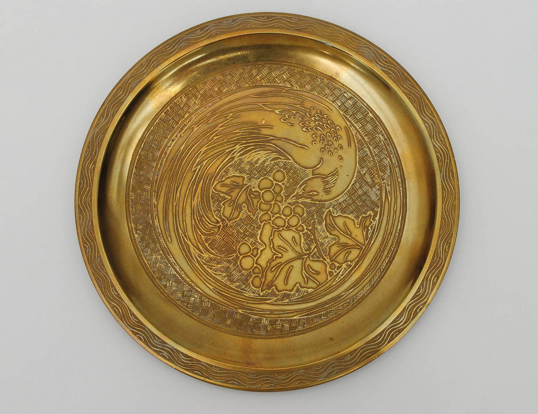 TIFFANY STUDIOS SPUN METAL DISH: American. Circa 1925. Stamped Tiffany Studios, No. 2014. Diameter 8". (200/300)