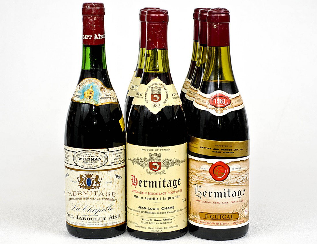 EIGHT BOTTLES OF WINE: Four bottles of Hermitage - 1982 (Jean-Louis Chave); Three bottles of Hermitage - 1983 (E. Guigal) and One bottle of Hermitage - 1980 (Paul Jaboulet Aine la Chapelle) (150/250)