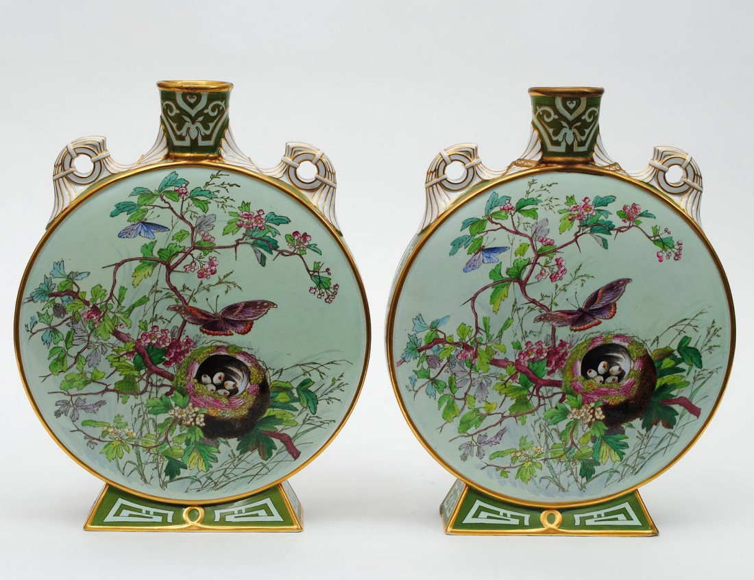 PAIR OF MINTON PORCELAIN MOON FLASK VASES: English. Impressed Minton, 1408 and date mark for 1917. Each with shoulder loop handles. Height 13 3/4". (Cond: each restored) (1500/2000)