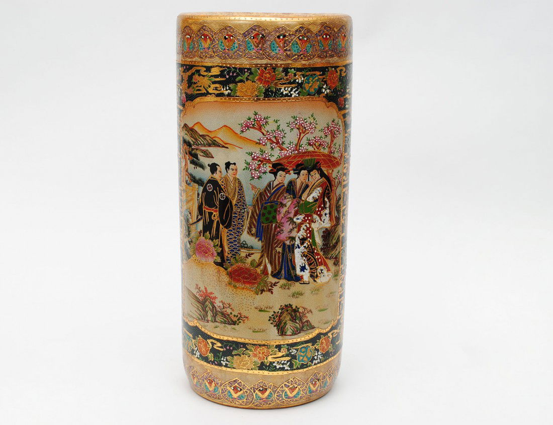 EARTHENWARE UMBRELLA STAND: Japanese. Decorated with reversed figural panels. Height 18 1/4". (100/150)