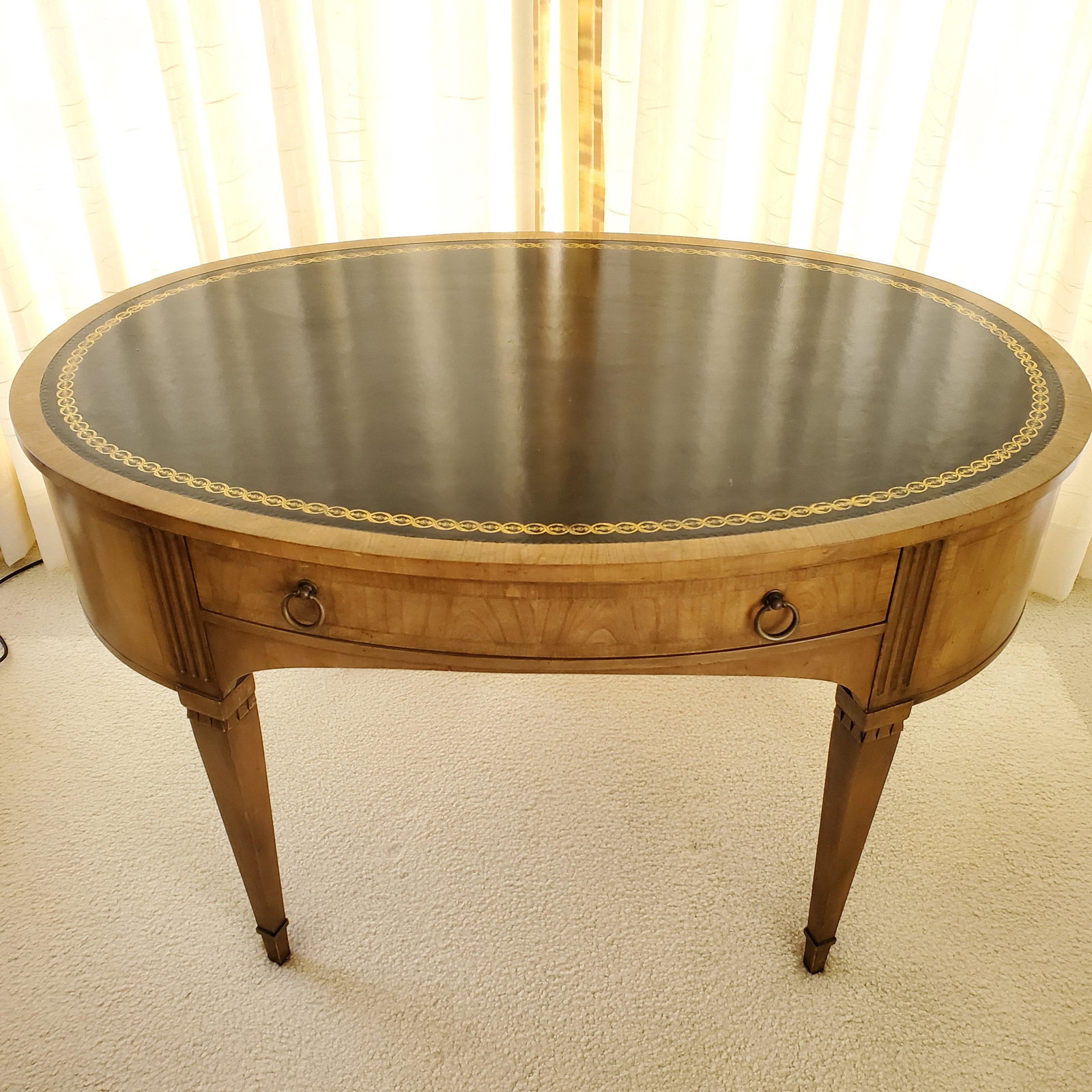 Baker Mahogany Oval Leather Inset Desk, 20th Century, with Baker tag inside drawer, 29 1/2" h. 48" (1 of 3)