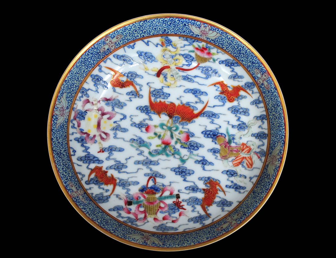 FAMILLE ROSE PORCELAIN DISH: Chinese. Guangxu mark and of the period. 1875-1908. Enameled with bats and precious objects. Diameter 8". (600/900)