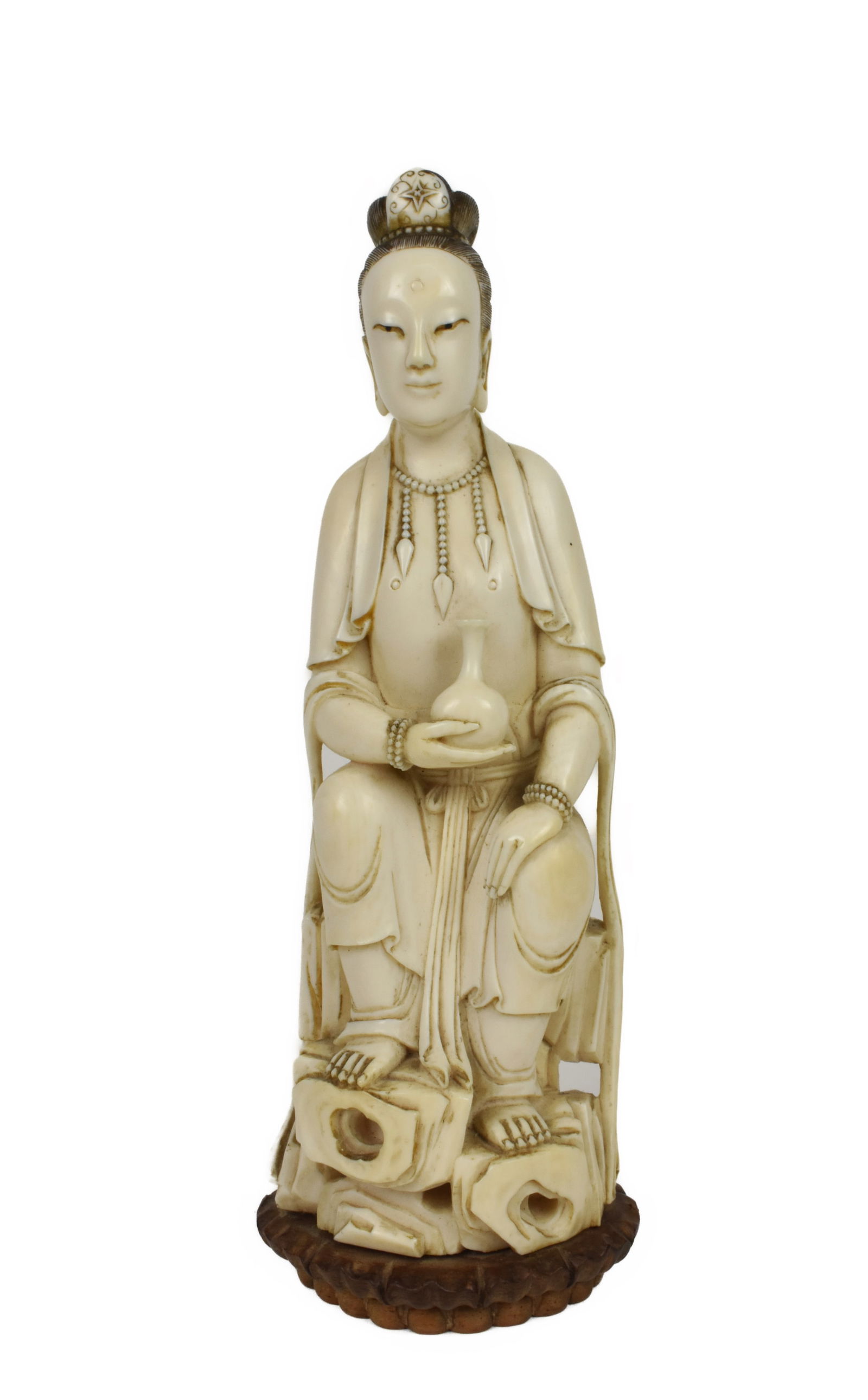 A Chinese Carved Figure of a Goddess Holding a Vase Seated on a Rocky Ground, Early 20th Century, (1 of 5)