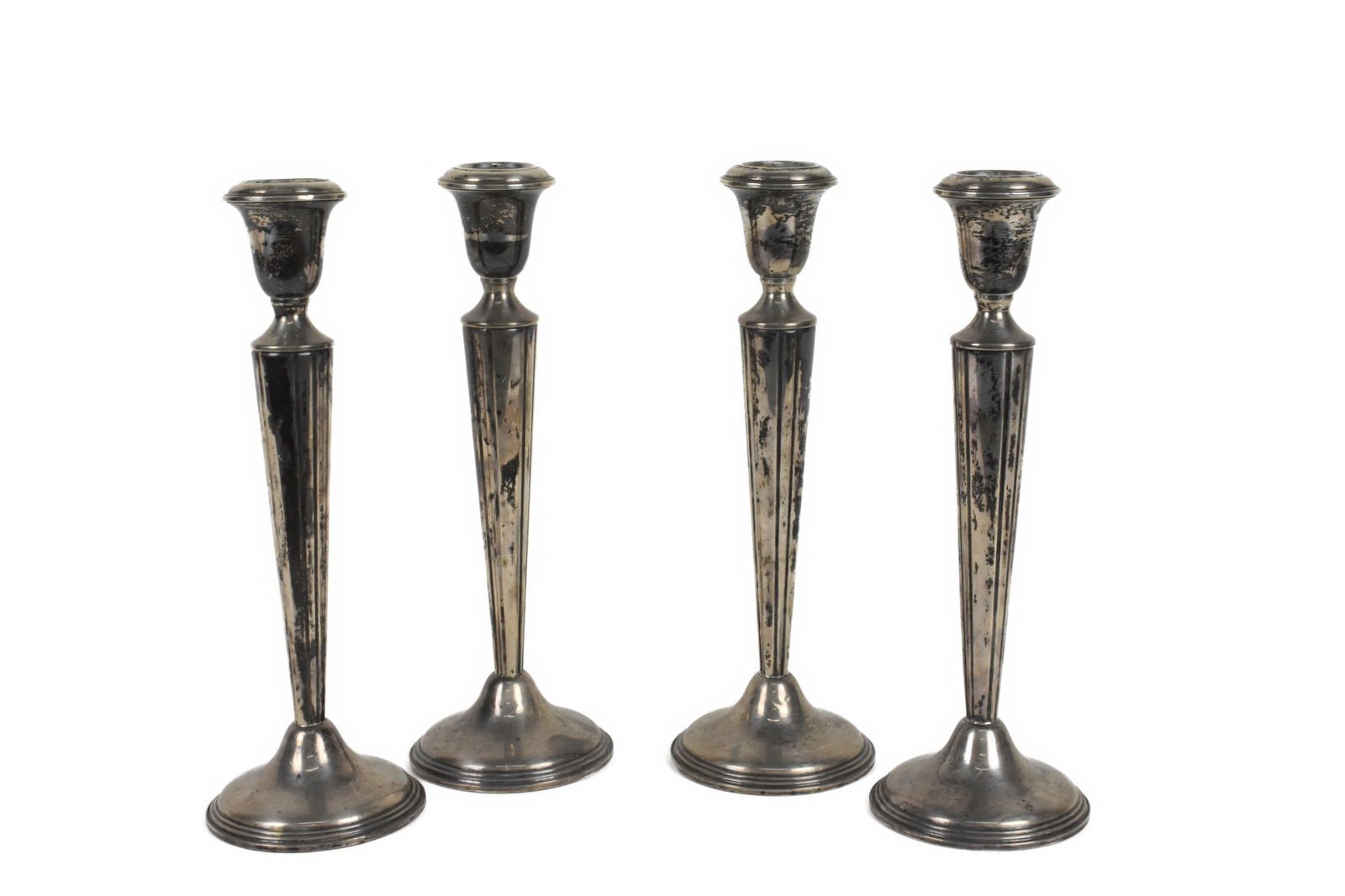 Group of Four J. E. Caldwell Sterling Silver Candlesticks, weighted bases, 10" h. (1 of 3)