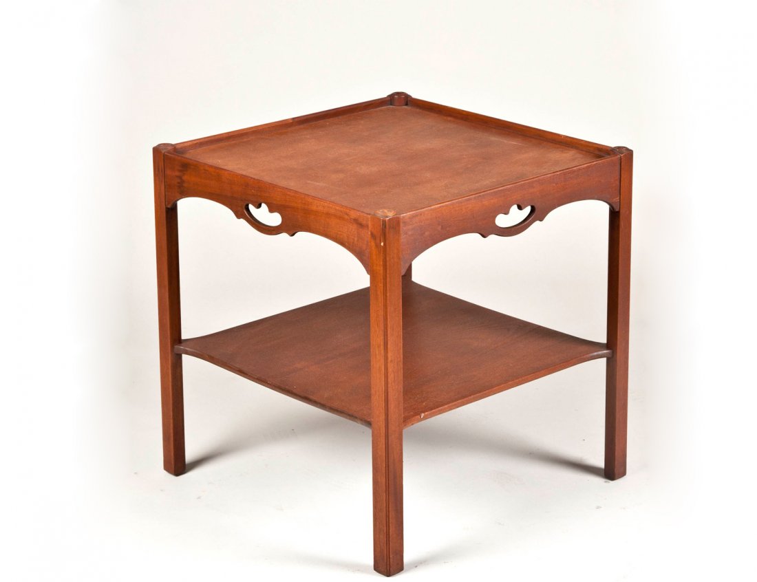 KITTINGER FRUITWOOD SIDE TABLE: American. With original paper label and branded mark. The square tray top with hand holds, raised on square legs joined by a platform stretcher. Height 26”. Width 25”. Depth 25”. (150/250)