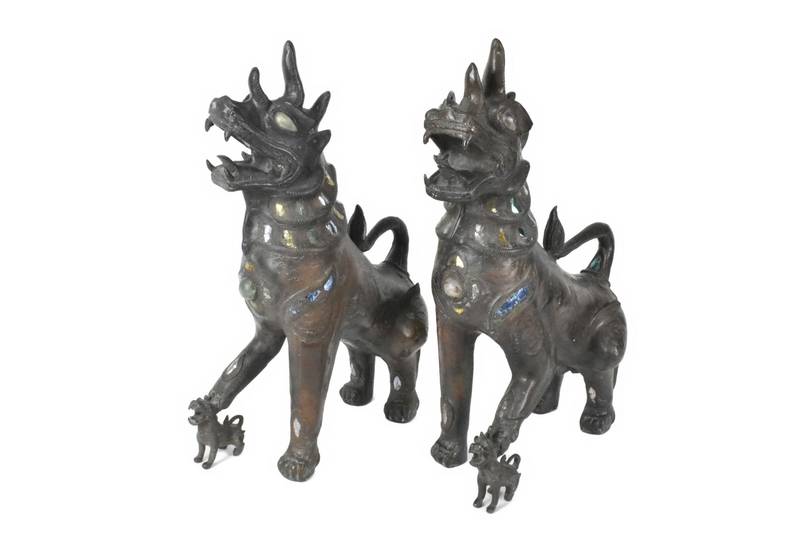 Pair of Bronze Foo Dogs Attributed to Karl Springer, 20th Century, each with polished stone eyes and (1 of 5)