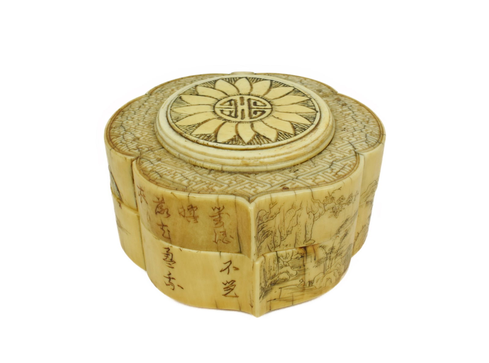 Antique Japanese Carved Flori-Form Lidded Box with poetic inscription and landscape, 1 3/4" h. 3": Antique Japanese Carved Flori-Form Lidded Box with poetic inscription and landscape, 1 3/4" h. 3" w. Note: This item must be picked-up from the gallery by a Florida resident or an agent assigned by th
