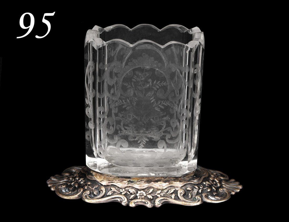 CONTINENTAL SILVER AND GLASS TOOTHPICK HOLDER: German. Circa 1910. (.800 Fine) Etched with foliage. Height 2 3/4". (250/350) Note: This lot is being re-offered for sale due to the fact that Mr. Keith Dowd of Ekaterina’s Antiques in Reno, Nevada