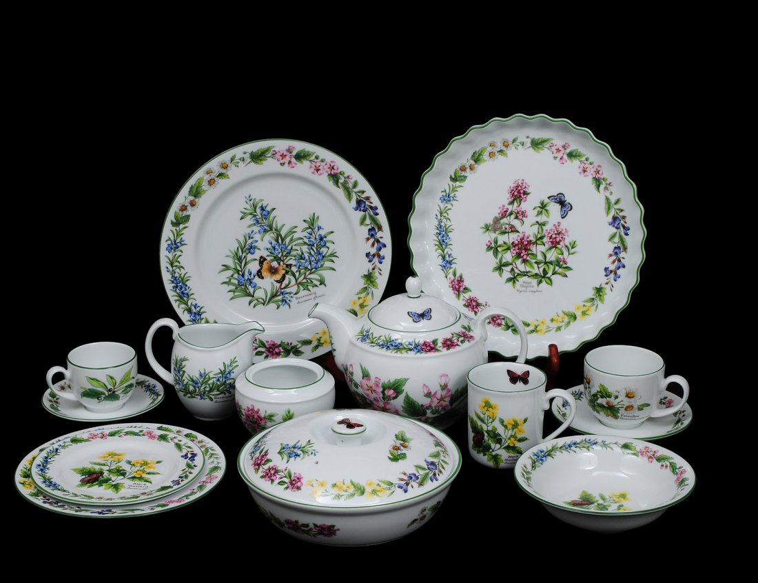 SIXTY-TWO PIECE ROYAL WORCESTER PORCELAIN PART DIN: English. In the "Worcester Herbs" pattern. Comprising: four dinner plates, seven salad plates, eight bread and butter plates, three cereal bowls, eight tea cups and saucers, six coffee cups and saucer