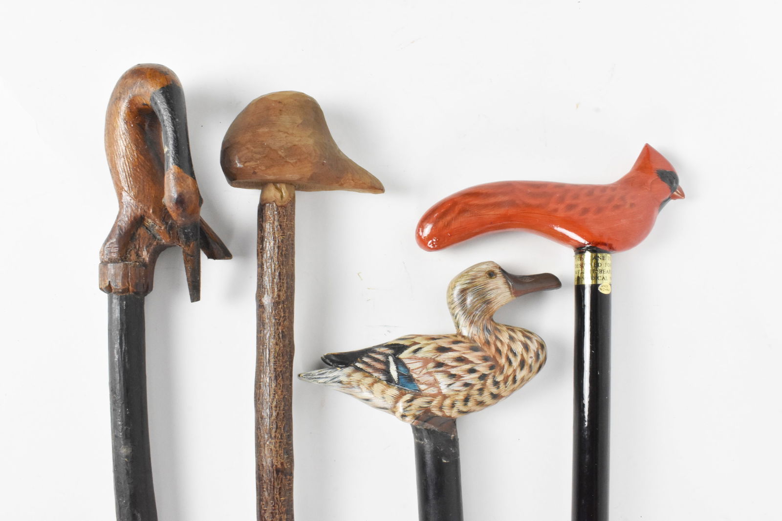 Group of Four Canes/Walking Sticks made of wood, (1 of 6)