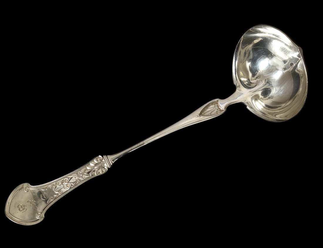 STERLING SILVER LADLE: American. Late 19th Century. Maker: Gorham. In the "Corinthian" pattern. Length 13 1/4". (7 oz) (200/300)