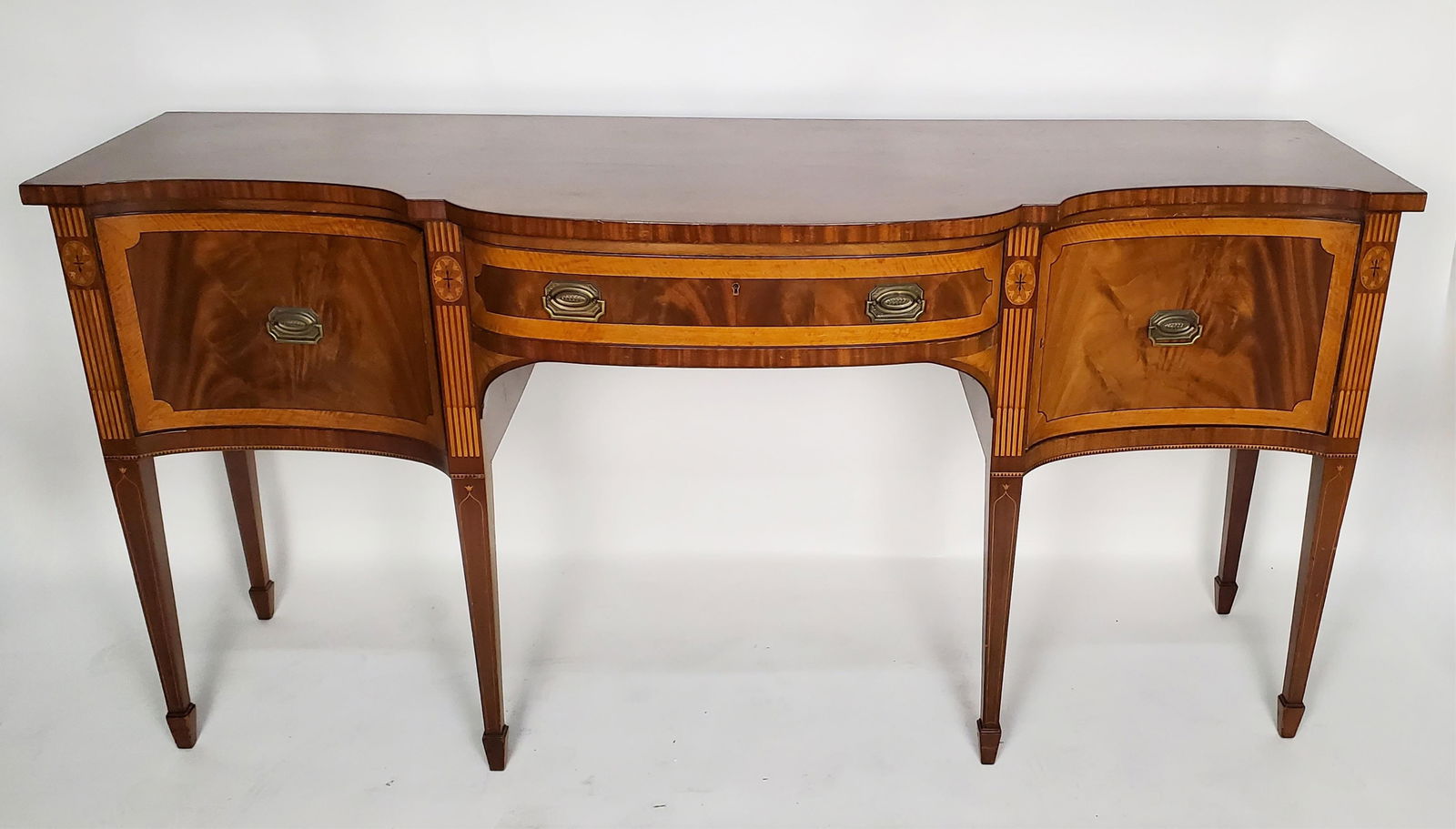 A 20th Century Hepplewhite Style Serpentine Front Sideboard, faux inlaid veneer, two doors, one (1 of 4)